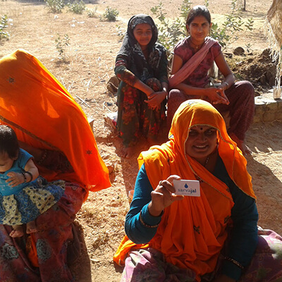 villagers-holding-sarvajal-card