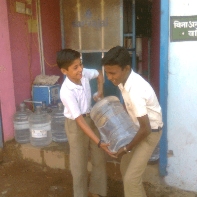 children-holding-water-jug
